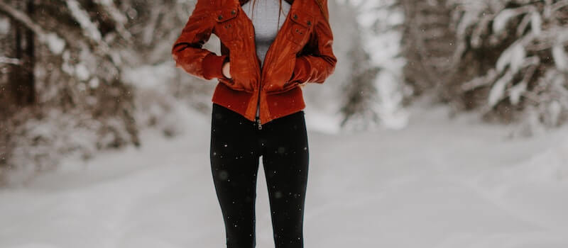 A woman wearing fleece winter leggings